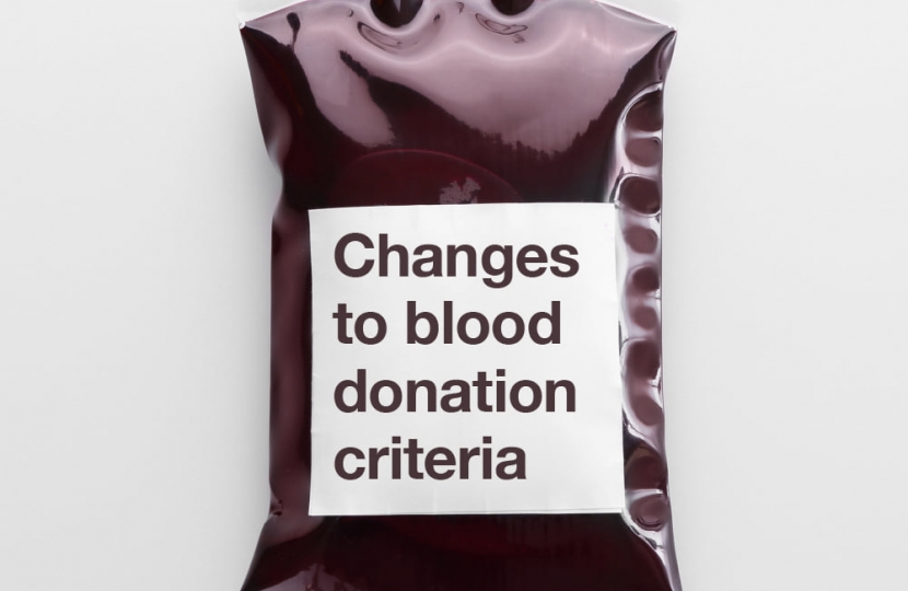A blood bag with "Changes to blood dontation criteria" written on it