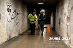 James Daly MP walks with Police Officer