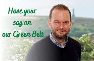 James Daly stands in front of Holcolmbe Hill. A graphic asks you to have your say on the Greenbelt